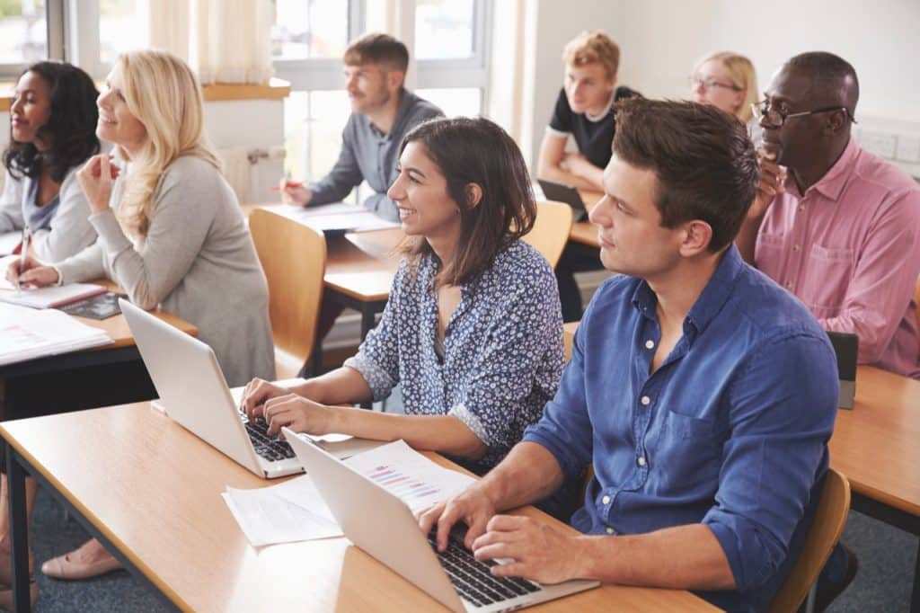 Audiences listening in a classroom