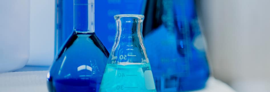 Laboratory instruments with blue liquid